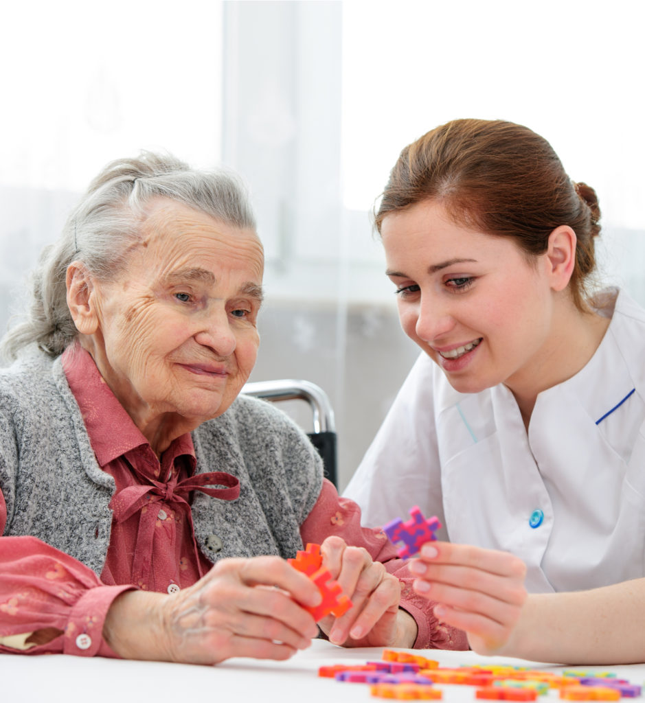 senior woman with her elder care nurse